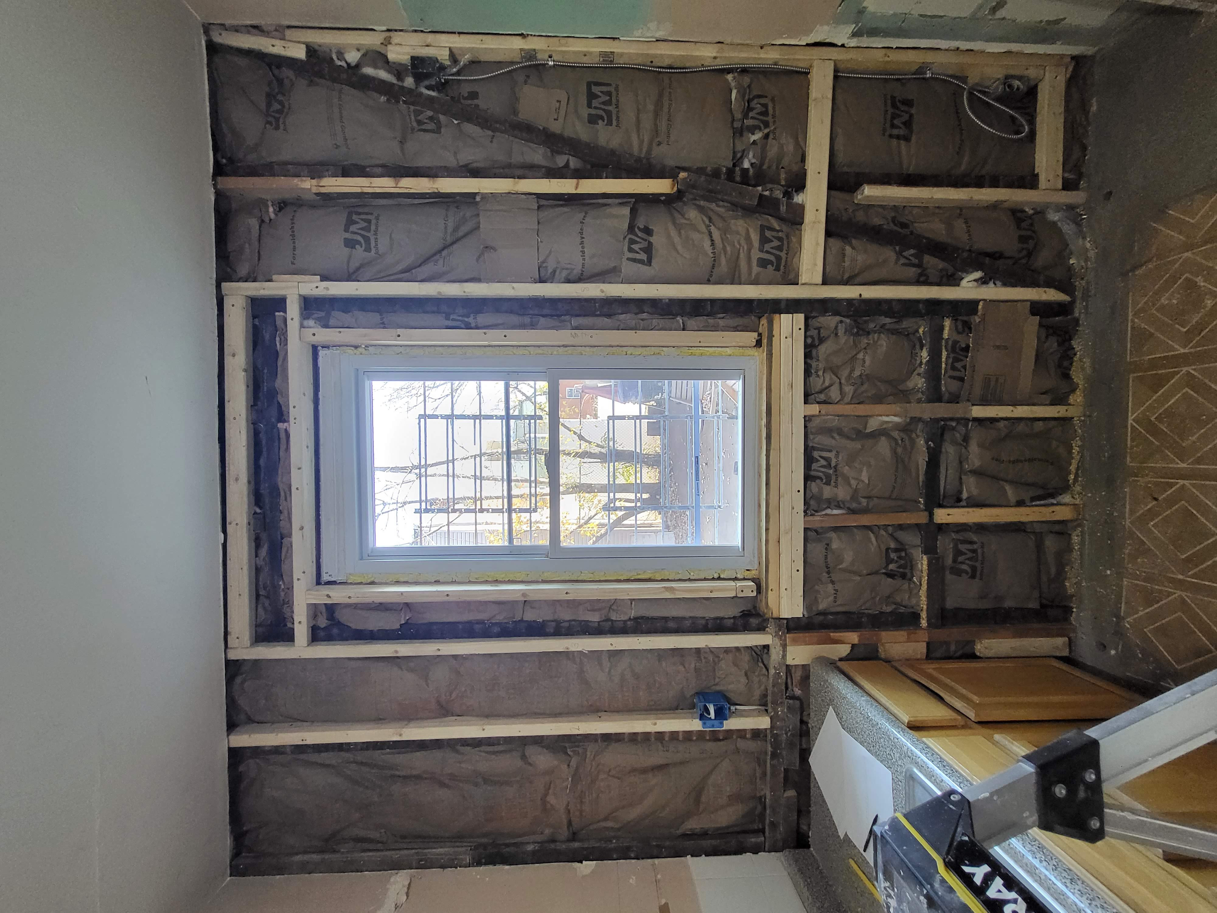 Sheetrock and framing work by HomeUpdate contractors (drywall and wall framing)
